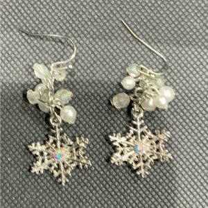 Pearl and silver snowflake dangle earrings